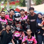 Devin Nastazio Sikat Gelar Juara Umum Matic Open di Road Race Pelalawan